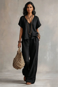 Model wearing the black Marlowe Relaxed Two-Piece Set